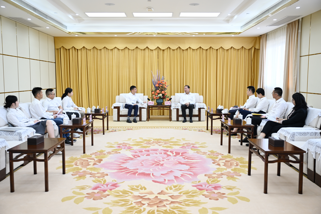 范少军会见米兰网址智能董事长付向东